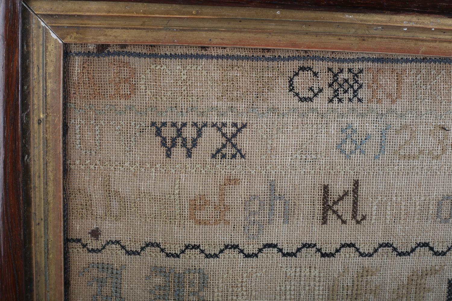 A 19TH CENTURY SAMPLER worked by 'Ellen Bacon Aged 11 1877 Bastow Church School , in coloured - Image 4 of 5