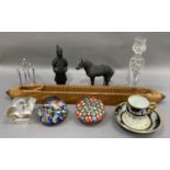 A mill shuttle, cut glass candlestick, two paperweights, coffee can and saucer, desk toy and two