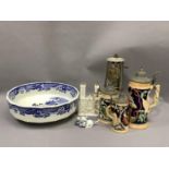 A miner's lamp, steins, a blue and white toilet bowl, a crested china model of York minster and