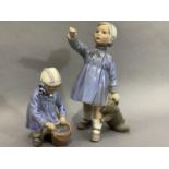 Two Royal Copenhagen figures of a girl and teddy bear, 14.5cm (chipped) together with a young girl
