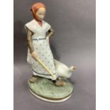 A Royal Copenhagen figure of goose girl and gander, printed and painted mark no.528, 19cm