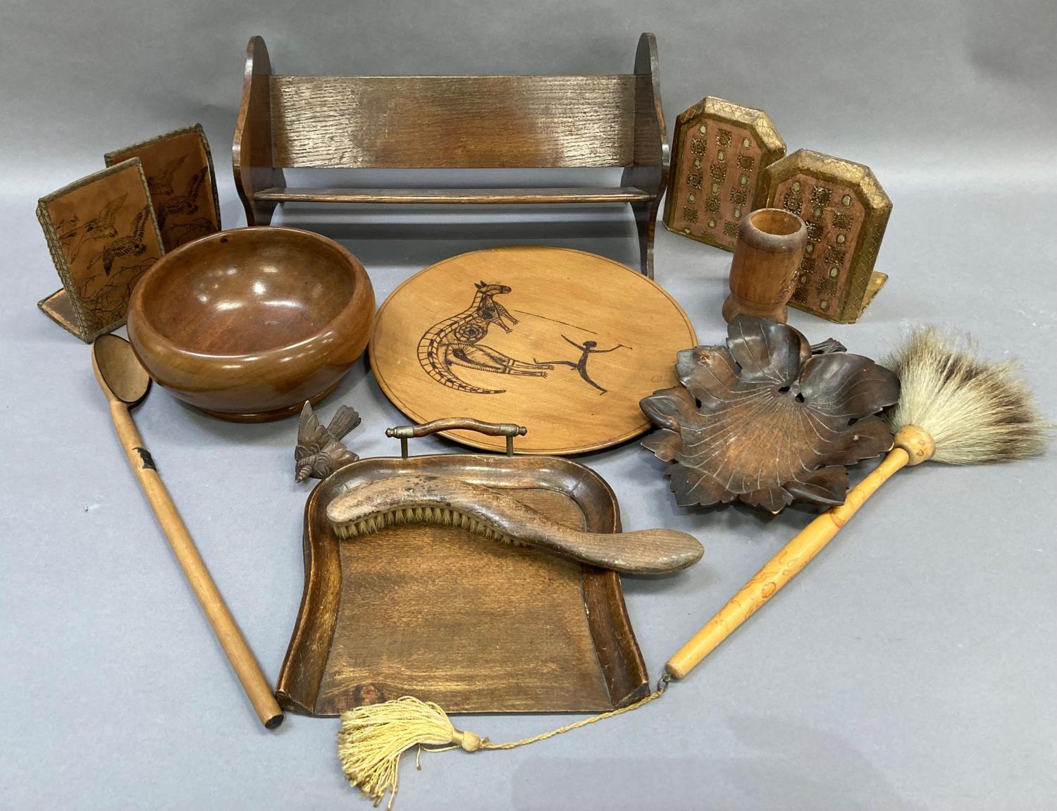 Treen including a book trough, fruit bowl, Australian plaque, crumb scoop and brush, fly whisk, long