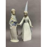 Two Lladro figures of a girl dressed as a wizard, 29cm, and of a girl wearing a shawl and carrying