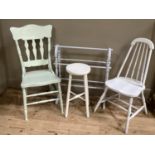 A group of two painted chairs, towel rail and stool