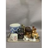 A Jasper ware jardiniere with pair of Watcombe single handled vases, an oak tobacco jar, a pair of