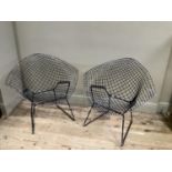 A pair of Bertoia Diamond style garden chairs