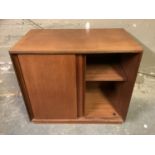 A G Plan teak cabinet with two sliding doors on plinth base, 77 cm wide