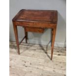 An early 20th century stained pine clerk's desk with lift up slope