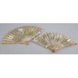 Two fans c 1900 with romantic themes, the first with a silvered and gilded pink mother of pearl