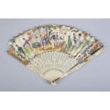 An 18th century ivory fan, the monture finely carved and pierced, the gorge particularly