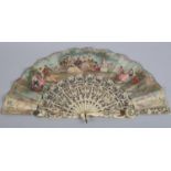 An ivory fan with fold out magnifying glass as an addition to the upper guard: Mid- 19th century,