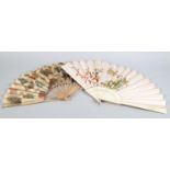C 1890's, two large and attractive folding fans, the first with pierced bone monture, the cream silk