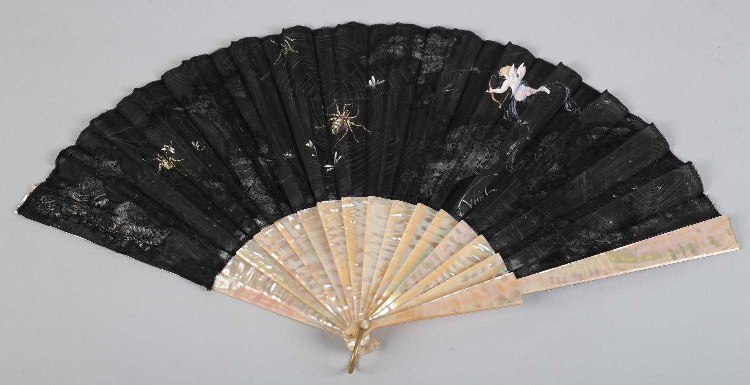 A circa 1880's fan with plain but striking pink mother of pearl monture, the black gauze leaf