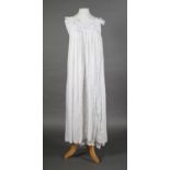 A fine and very long 19th century Ayrshire work christening gown, with an exquisite bodice front