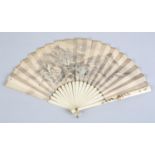 A 19th century Japanese ivory fan with birds, flowers and foliage lacquered in colours on the