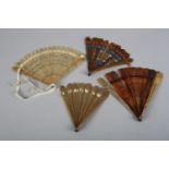 Four early 19th century brisé fans, to include a tortoiseshell (or possibly dyed horn) example,