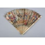 An early 18th century ivory fan, the upper guards carved with panels containing fish, crustaceans,