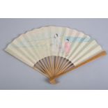 A Japanese erotic fan, the simple monture of bamboo, the paper leaf designed to open in the normal