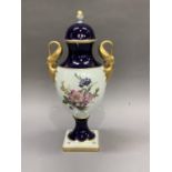 A Kaiser Echtscharffeuer Kobalt Imperial vase and domed cover with bud finial, twin swan handles,