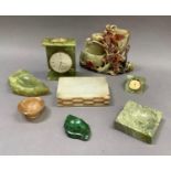 A soapstone carving of prunus blossom, various onyx and malachite dishes, cigarette box, clock etc