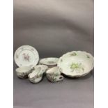 A quantity of French Luneville pottery tea ware printed and enamelled with sprays of flowers,