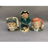 A musical toby jug in the form of Long John Silver, a Royal Doulton character jug Don Quixote and