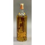 A novelty bottle by Marc Du pére Mathieu of Apple Dessert wine from Switzerland, the interior of the