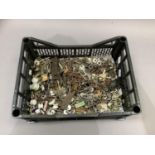 A large quantity of keys and some ceramic cupboard door knobs