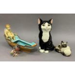 Brownfield cherub in a boat (lid missing), a Just Cats model of a black cat, Beswick group of two
