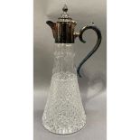 A Stuart cut glass and silver plated mounted claret jug cut, bordered with swags above a broad
