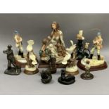 Various resin figures of fishermen, doves amongst tree branches, mice on a chamber stick, pair of