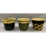 Three various pottery planters, 29cm high by 37cm diameter