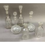 Three pairs of Victorian and later decanters