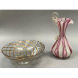 Two pieces of Venetian glass including a white latticino and puce ribbon glass ewer, 13cm and a gilt