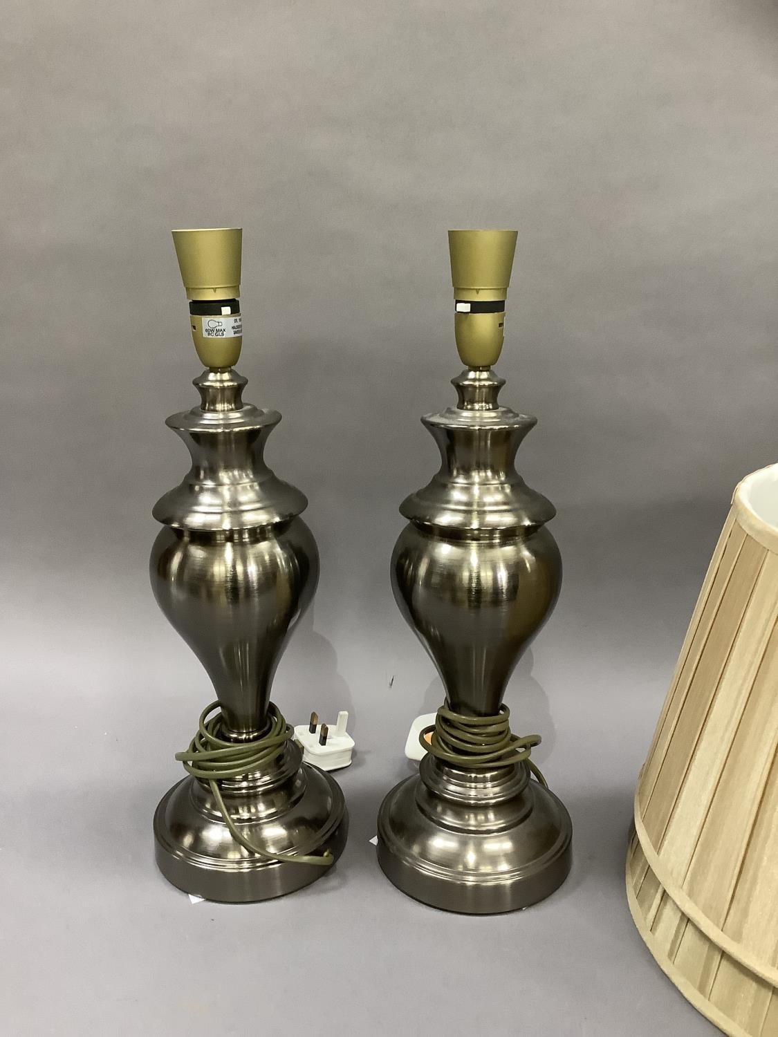A pair of pewter coloured table lamps of baluster form on circular bases complete with shades, - Image 2 of 2