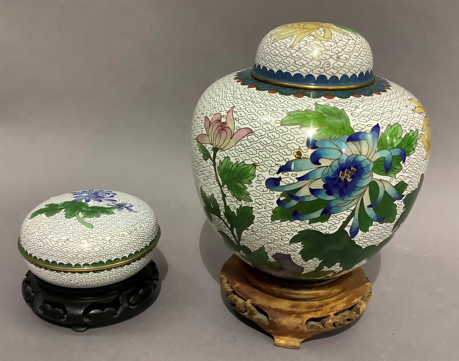 A cloisonné vase and domed cover with matching box of compressed circular form each enamelled with