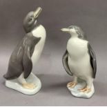Two Lladro penguins, 17cm and 14cm high