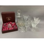 A cut glass decanter, flower vases, wine goblets, rose bowl, table bell and a Balmoral whisky