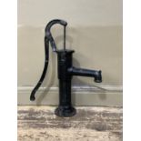 A black painted cast iron water pump