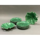 A set of ten Copeland green glaze leaf moulded dessert plates and a pair of dessert serving