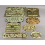 A group of eight brass and bronze name plates including business plaques, machinery etc