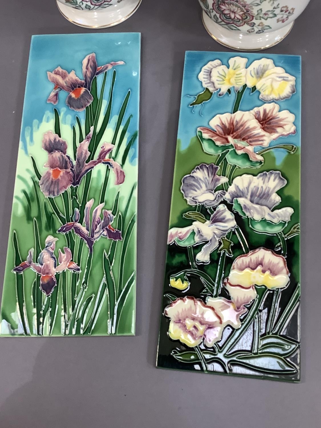 A pair of rectangular ceramic tiles, tube lined and glazed in floral design together with a pair - Image 2 of 4
