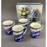 A boxed set of four Spode blue Italian coffee mugs, as new in original presentation box