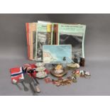 Union Jacks, pressed metal trinket dishes, glass scent, Russian cap badges and medals, soapstone