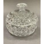 A cut glass powder bowl and cover