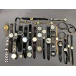 A collection of approximately thirty gentlemen's and lady's quartz wrist watches including makes