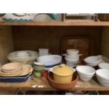A quantity of pottery and earthenware including pie dishes, oven to table ware, mixing bowls,