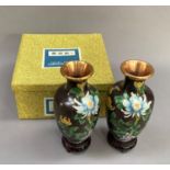 A pair of 20th century Chinese cloisonné, vases of shouldered ovoid outline, enamelled with peony in