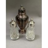 A pair of Elizabeth II silver mounted cut glass salt and pepper Birmingham 1989, 10.5cm high,