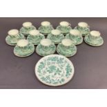 A Wedgwood green floral printed tea service for twelve including twelve cups, twelve saucers, twelve